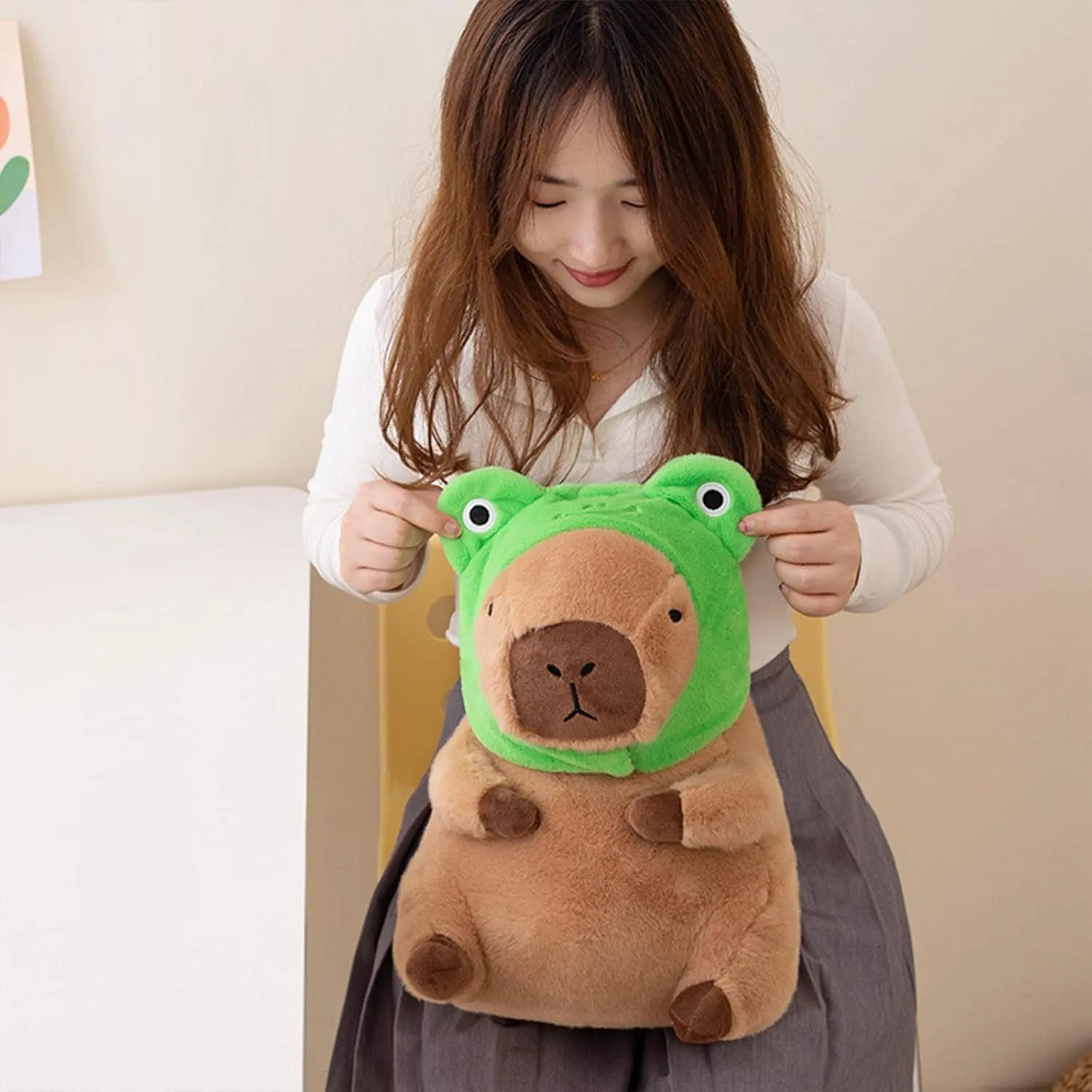 Ditucu Cute Capybara Plush Pillow with Wearable Frog Hat Stuffed Animal Capibara Plushies Toys Gifts for Kids Brown 11 inch